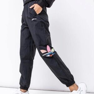 Trefoil track pants in black and multicolor